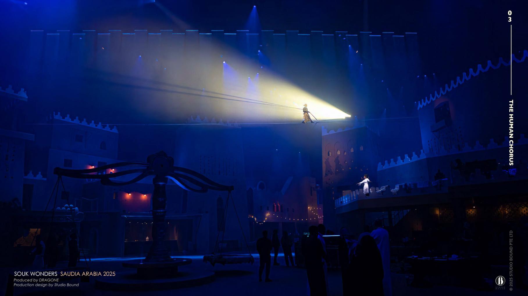 "The Human Chorus" — the souk dissolved into pure light and silhouette, the same set that read as a sunlit marketplace earlier in the evening now reframed as a nocturne. Production design by Patrick Larsen, Studio Bound.
