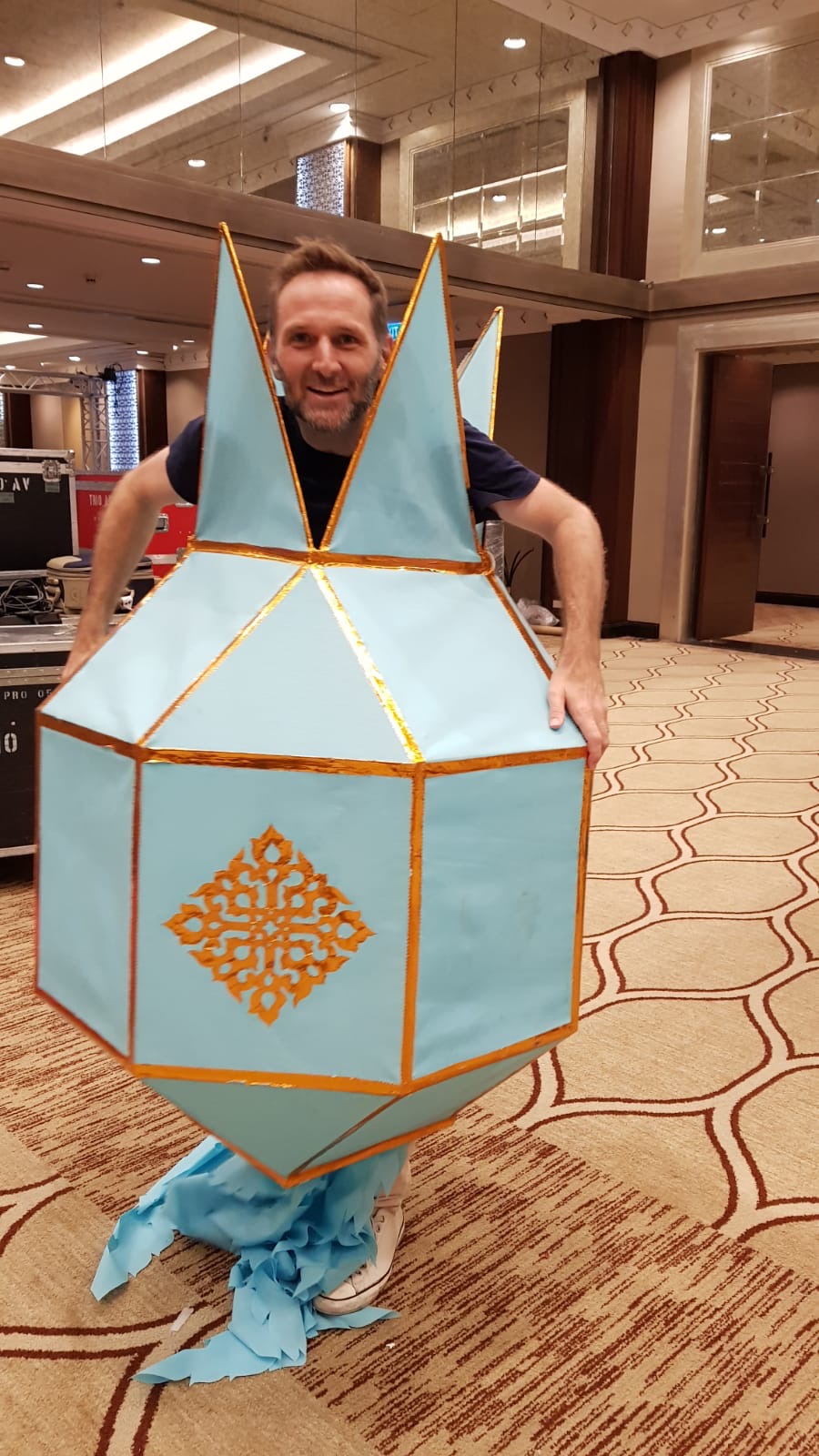 Patrick Larsen with a handcrafted lantern prop